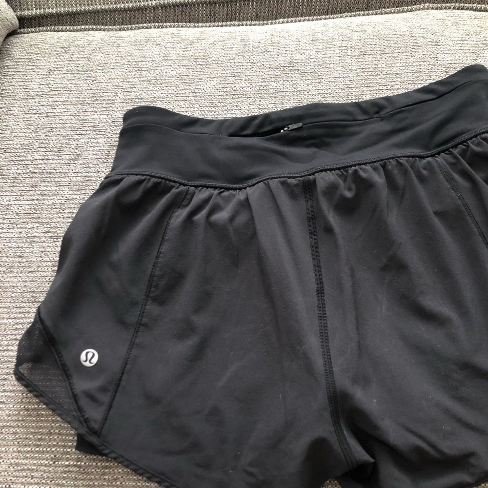 Lulu lemon athletic running shorts. Size 2. Black with undershorts built in.